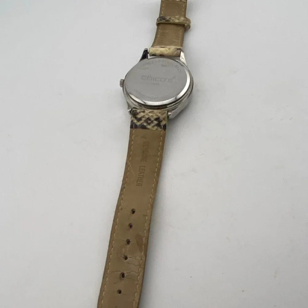 CHICO’S Women's Quartz Watch with Beige Snake-Print Leather Strap. It has a styl
